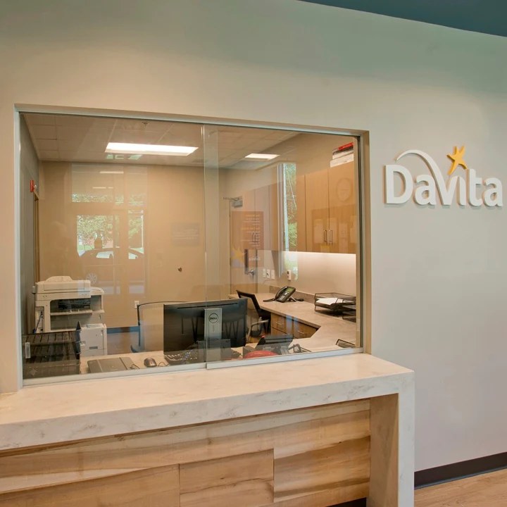 Healthcare reception desk with glass partition