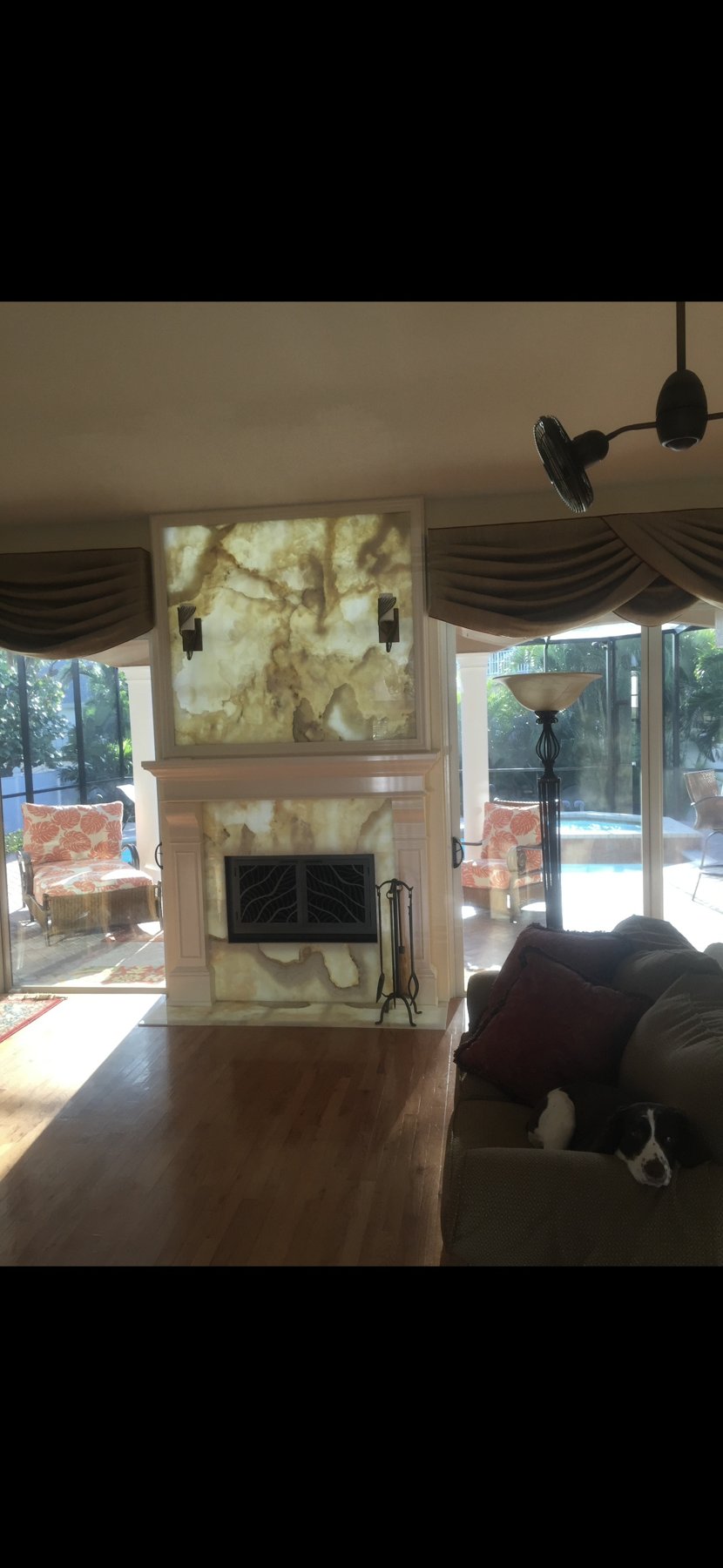Living room with garden views and fireplace