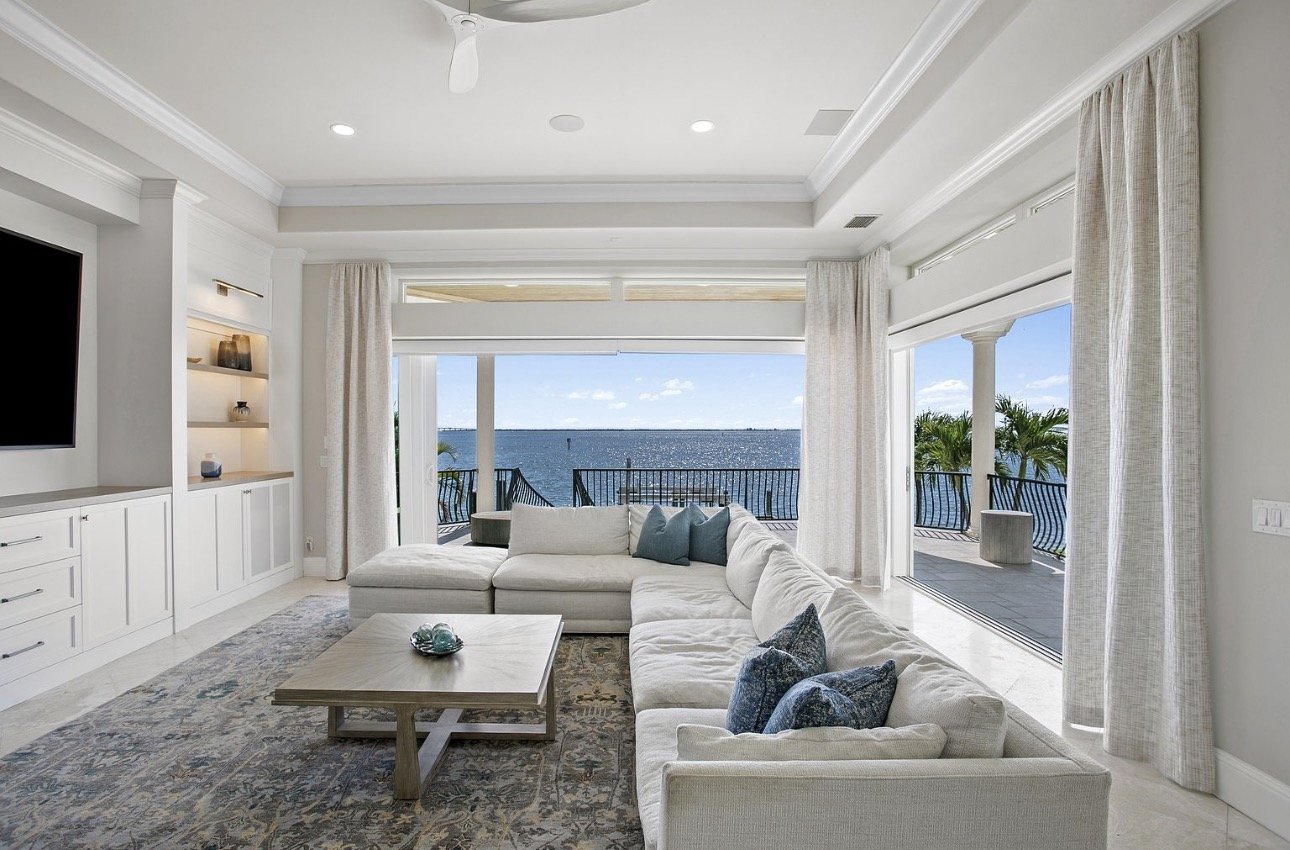 Coastal living room with panoramic water views